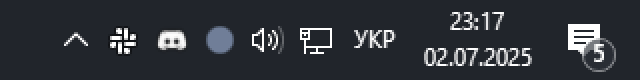 A screenshot shows the tray icon of the macro. It's a gray-blue-ish circle.